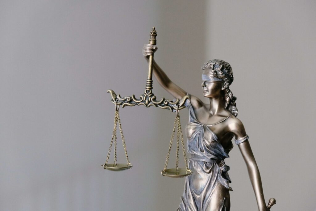 lady justice, representing the justice system, which oversees protection orders against domestic violence
