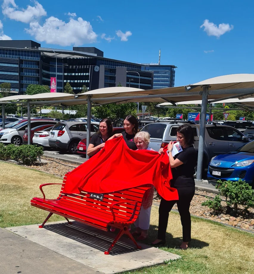 Red Bench being unveiled by Kath Manby and the VM family law team